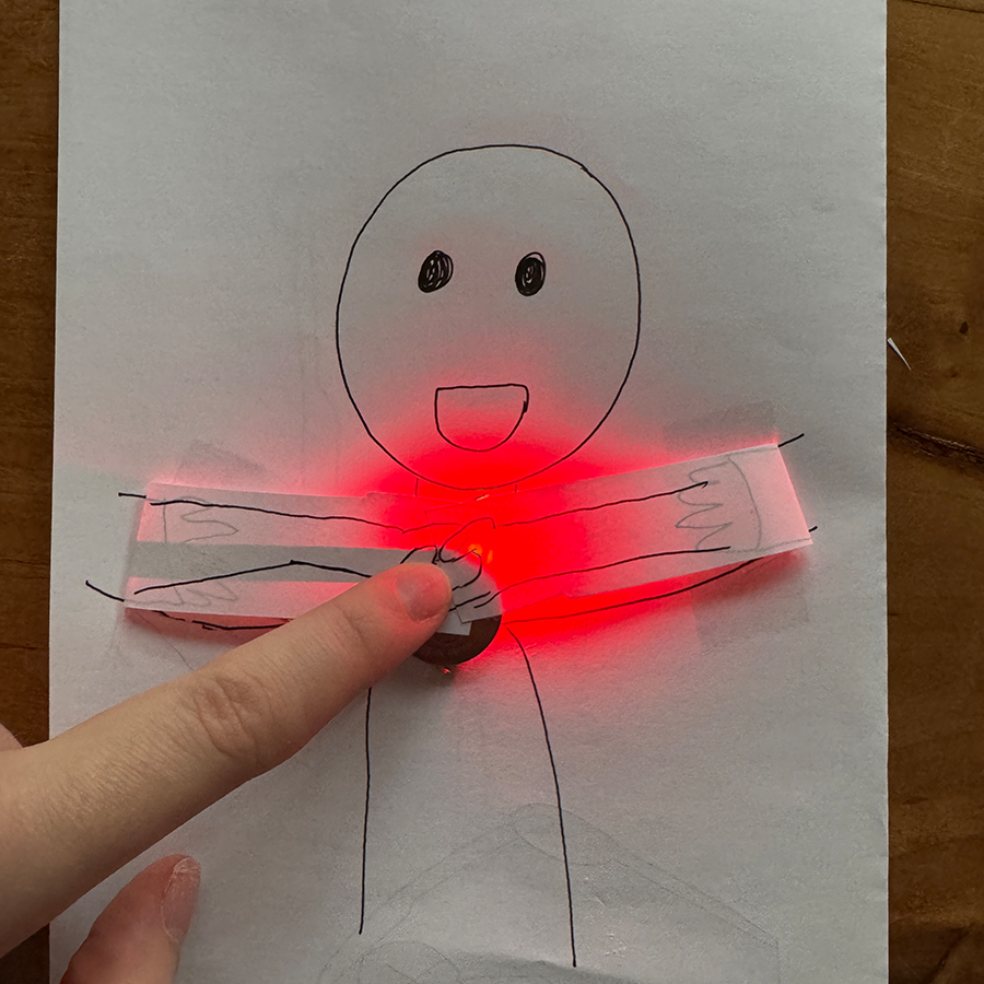 Pressing on the hand heart makes it glow. 