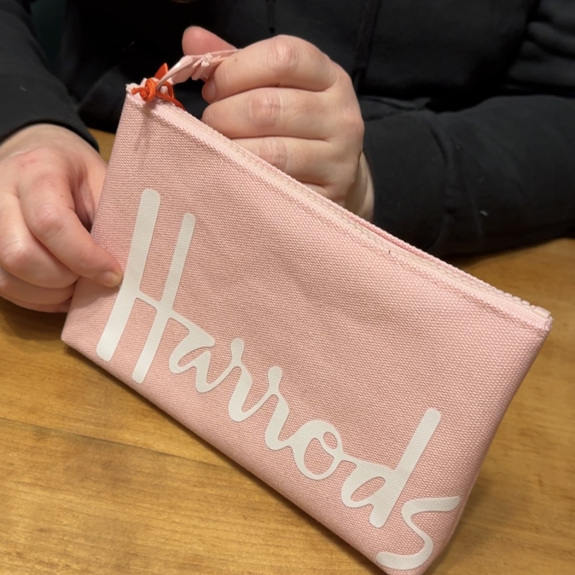 This is a makeup bag my dad gifted to me. The sound is of the zipper opening and closing.