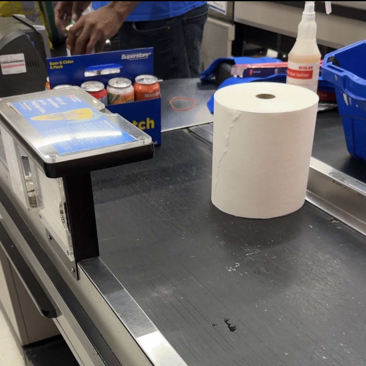 This is a picture of the conveyor belt at the grocery store. In the audio you can hear the cashier scanning my items.