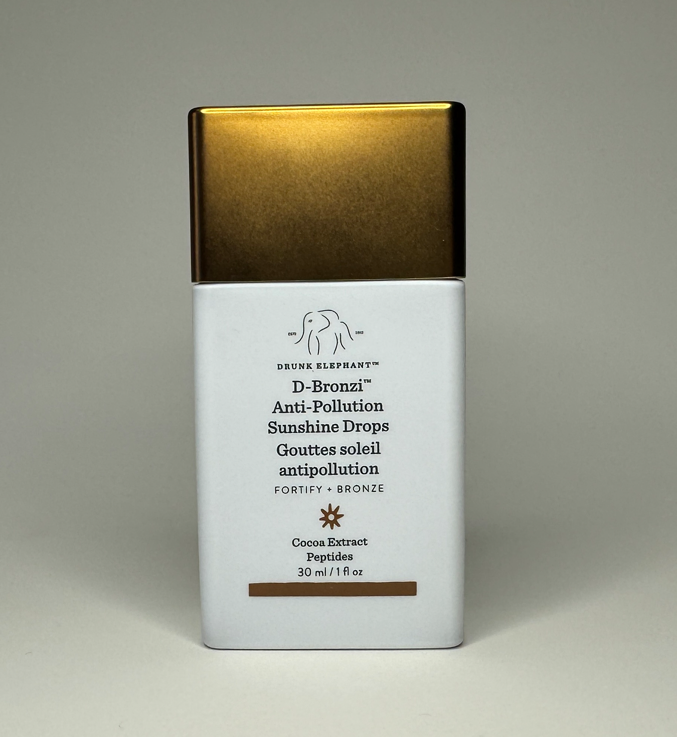 Image of the front of Drunk Elephant bronzing drops